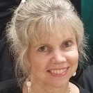 Headshot of Susan Mayes, B.S., M.A., CALP