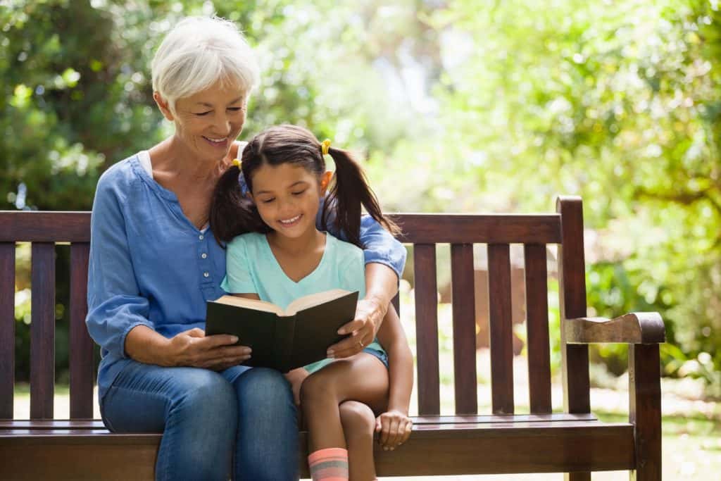 picture of adult reading to a child