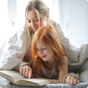 parent and child reading aloud