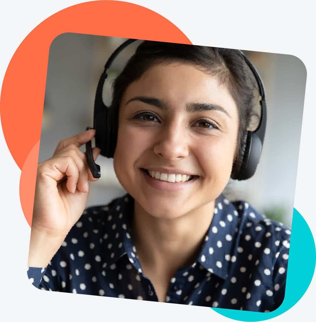 Lexercise therapist smiling while wearing a phone headset.